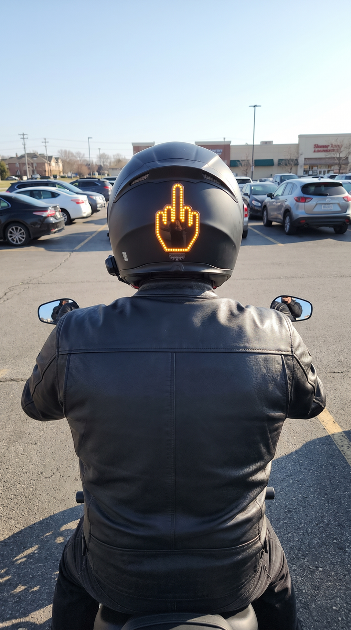 MotoRage light on helmet in parking lot
